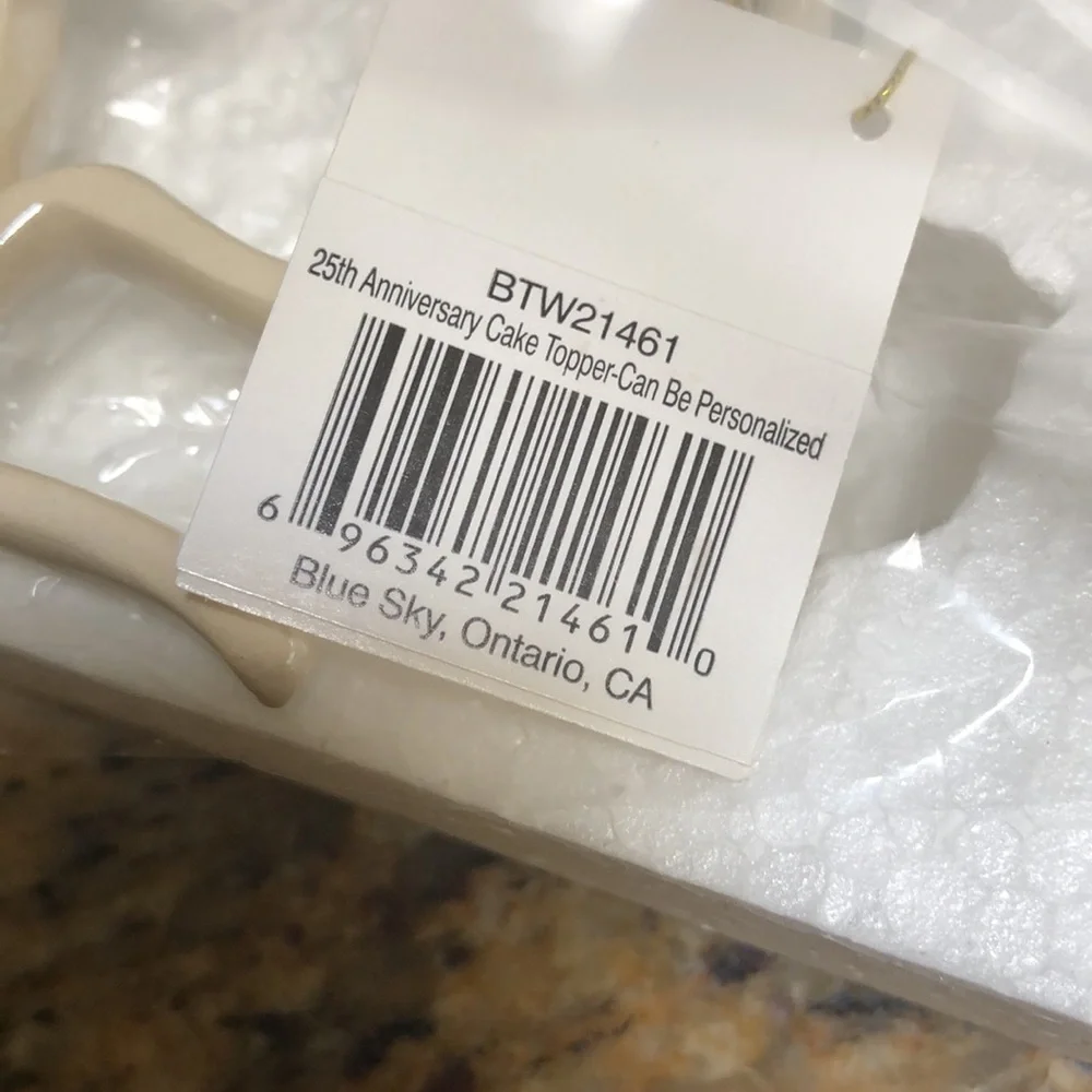 Blue Sky Clayworks 25th Anniversary Cake Topper by Heather Goldminc